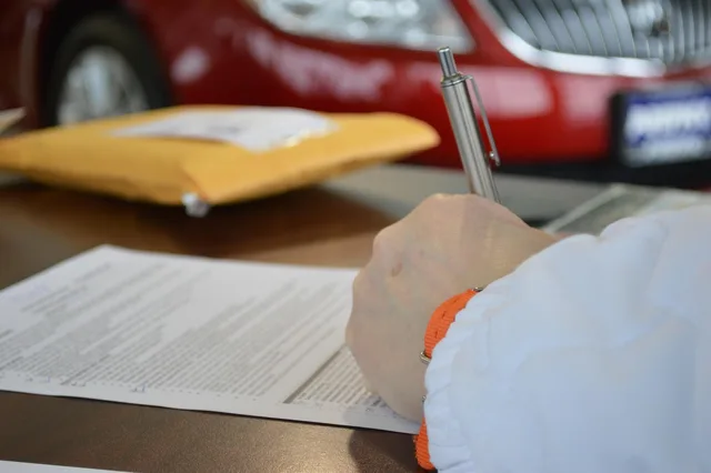 contract, business, document, sign, deal, legal, finance, paperwork, hand, loan, write, agreement, signature, legal, legal, loan, loan, loan, loan, loan. Five creator contracts risk scenarios to review before signing