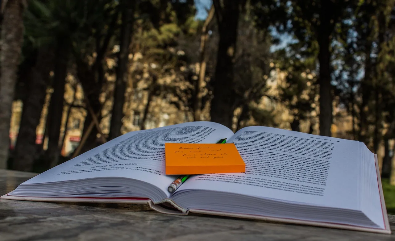 book, notepad, pencil, outdoors, nature, woods, forest, trees, sticker